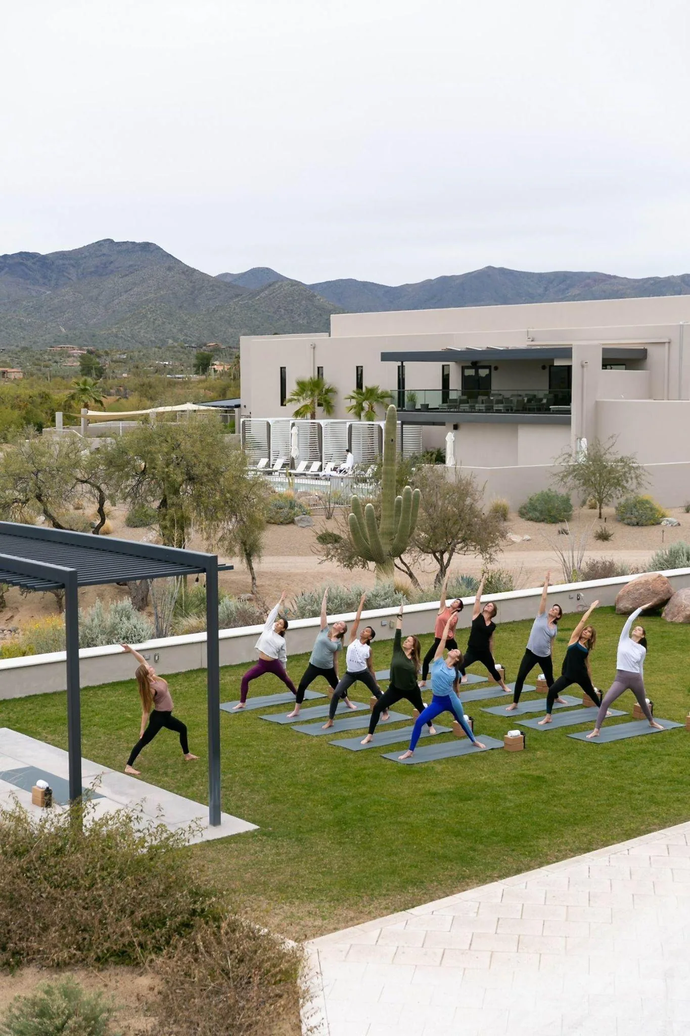 Outdoor yoga class on the Civana lawn